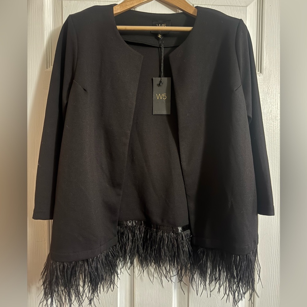 Beautiful W5 size large feathered bottom blazer